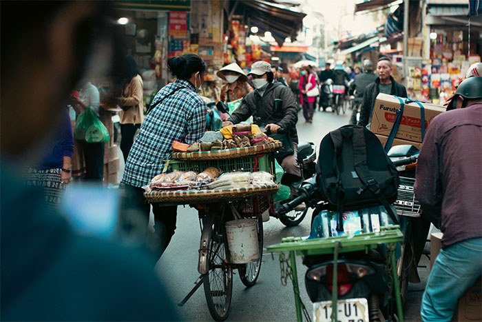 A food vendor on 36 streets of Hanoi